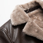 Men's textured winter coat with contrasting fleece-like trim and button front