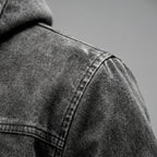 Men's grey hooded jacket with cream fleece-textured lining and zip pockets