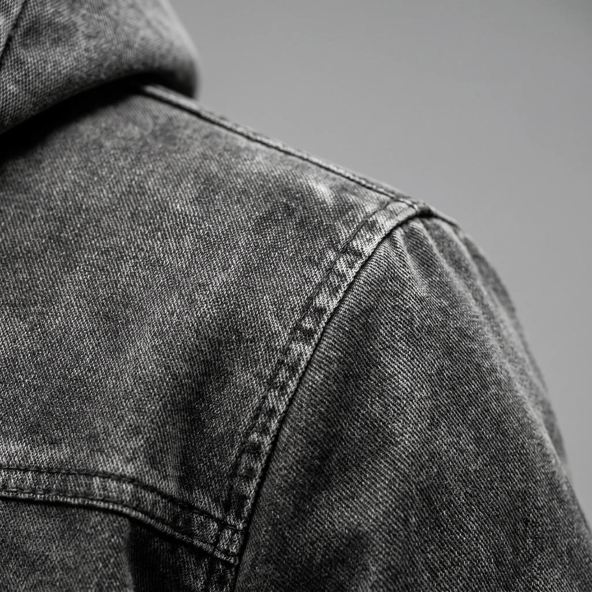 Men's grey hooded jacket with cream fleece-textured lining and zip pockets