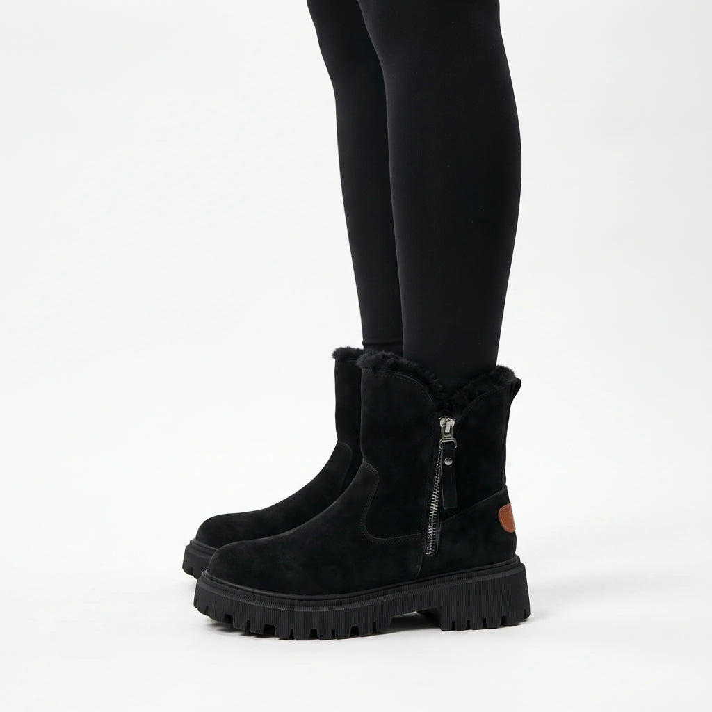 Women's lined ankle boots with side zips and chunky lug soles