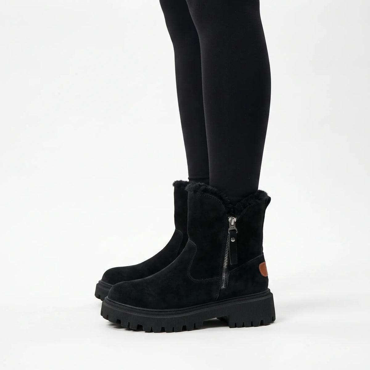 Women's lined ankle boots with side zips and chunky lug soles