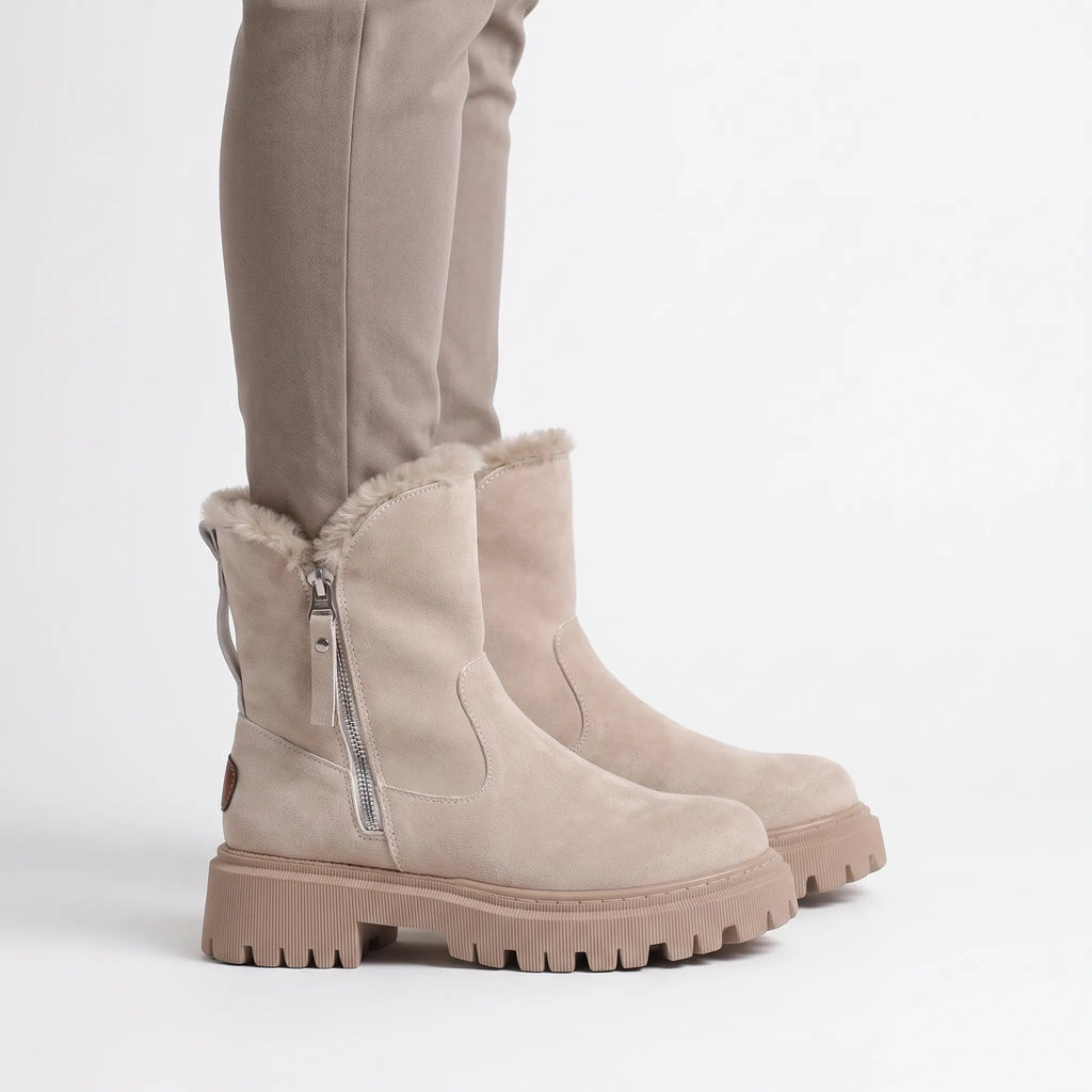 Women's lined ankle boots with side zips and chunky lug soles