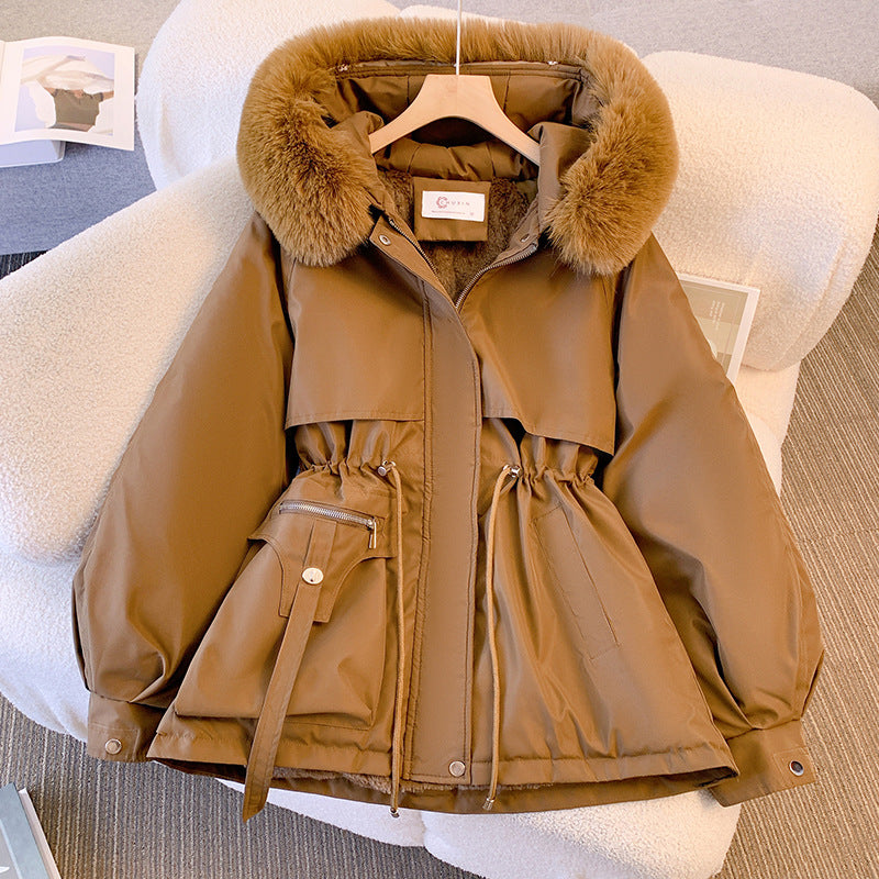 Women's hooded winter parka jacket with fur-trimmed hood and waist drawcord
