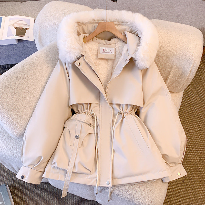 Women's hooded winter parka jacket with fur-trimmed hood and waist drawcord