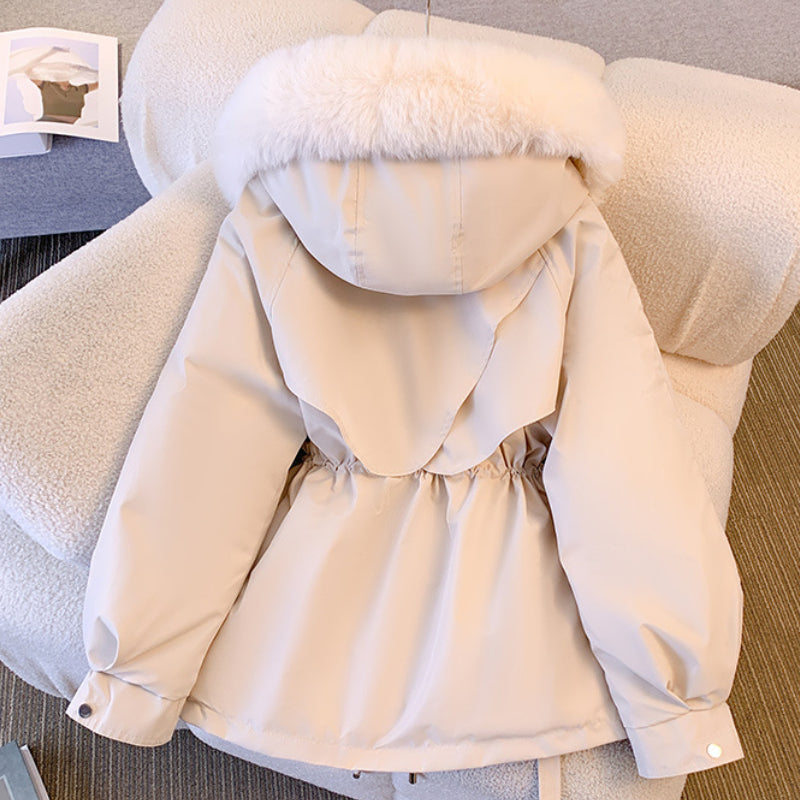 Women's hooded winter parka jacket with fur-trimmed hood and waist drawcord