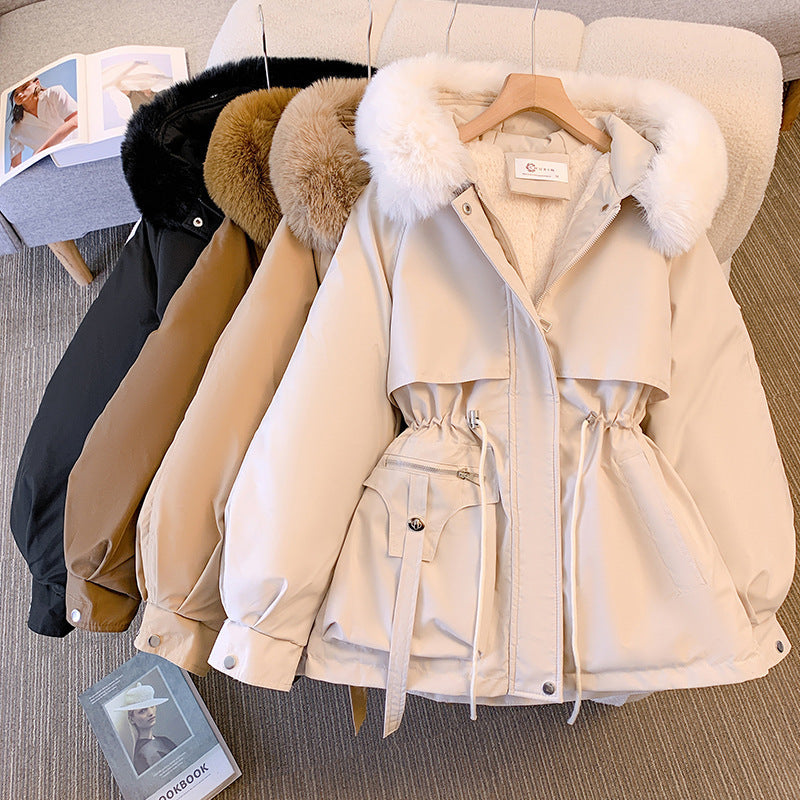 Women's hooded winter parka jacket with fur-trimmed hood and waist drawcord