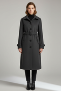 Women's long belted coat with pointed collar, button front and flap pockets
