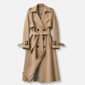 Women's belted double-breasted trench coat with long sleeves and checked lining