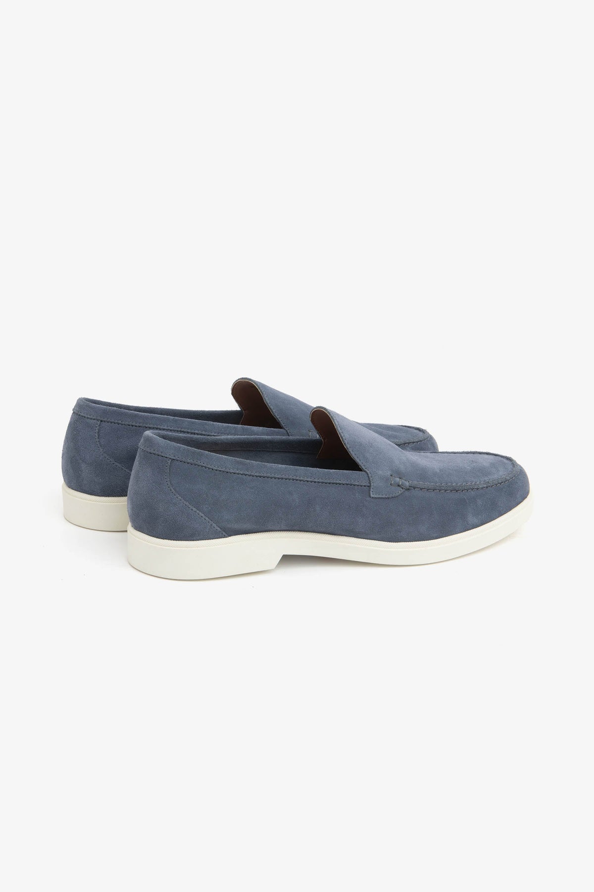 Men's blue moccasin loafers with stitched detailing and light flat soles