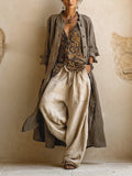 Women's beige three-piece outfit with printed sleeveless top, long cardigan and wide trousers