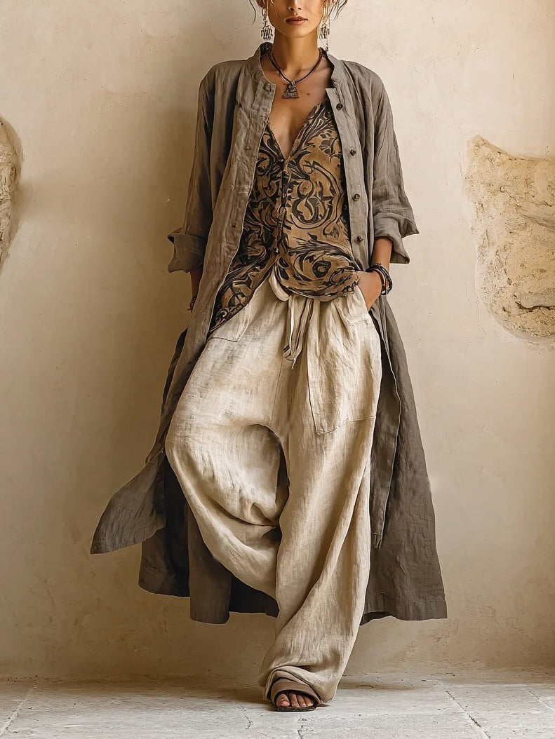 Women's beige three-piece outfit with printed sleeveless top, long cardigan and wide trousers