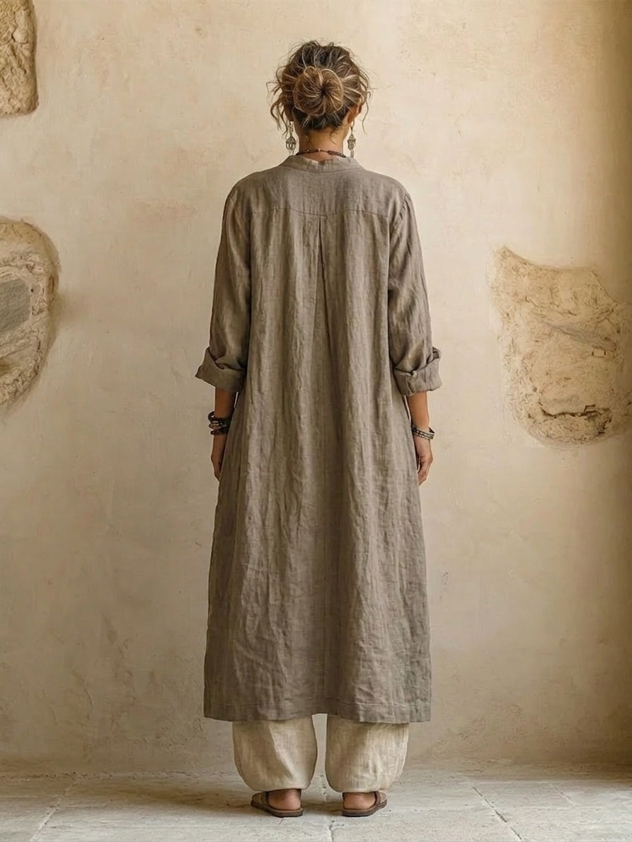 Women's beige three-piece outfit with printed sleeveless top, long cardigan and wide trousers