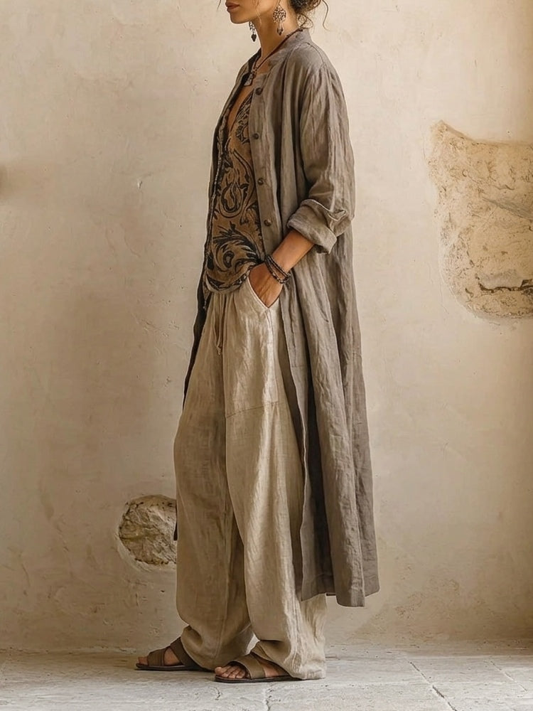 Women's beige three-piece outfit with printed sleeveless top, long cardigan and wide trousers