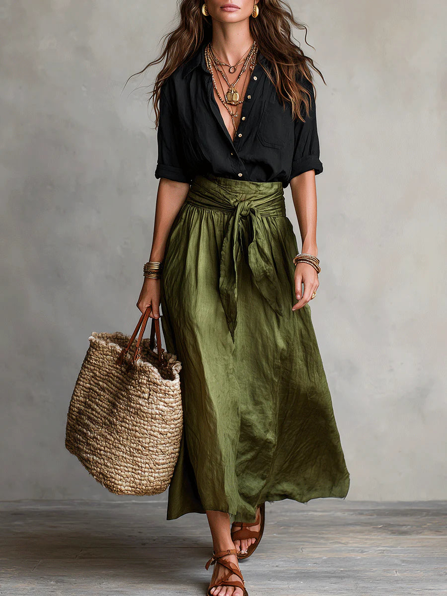 Women's black collared shirt and olive green high-waisted midi skirt set