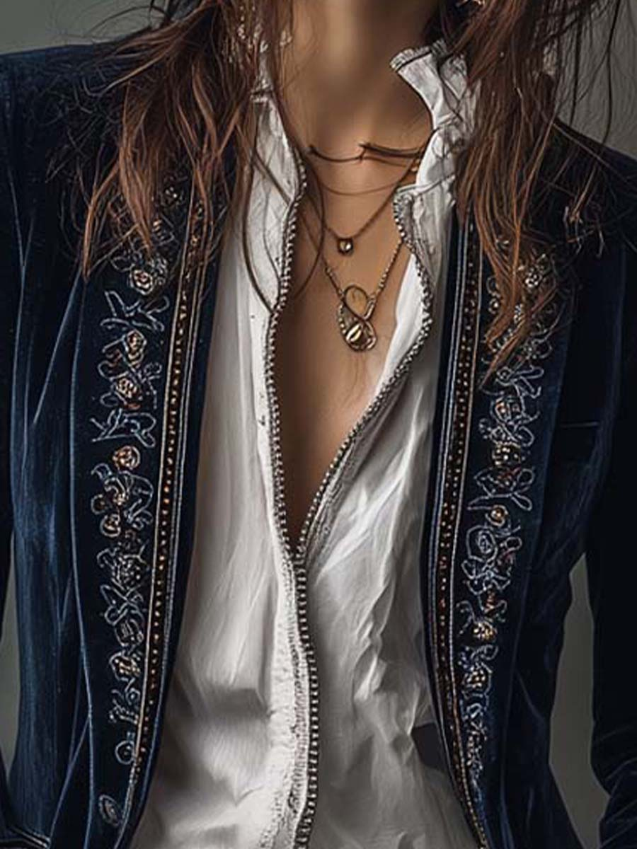 Women's navy long jacket with ornate embroidery, high collar and long sleeves