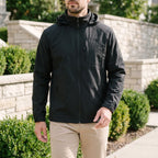 Men's hooded lightweight windbreaker jacket with full zip and zipped pockets