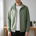Men's plain zip-front jacket with stand collar, long sleeves and zipped side pockets