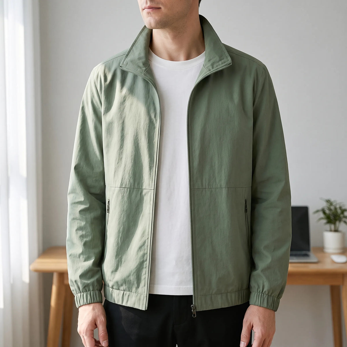 Men's plain zip-front jacket with stand collar, long sleeves and zipped side pockets