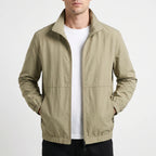Men's plain zip-front jacket with stand collar, long sleeves and zipped side pockets