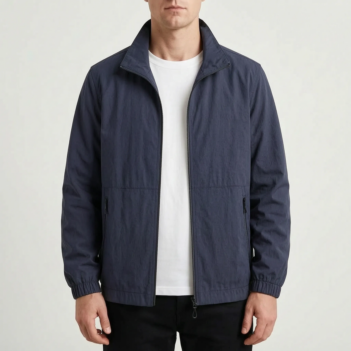 Men's plain zip-front jacket with stand collar, long sleeves and zipped side pockets