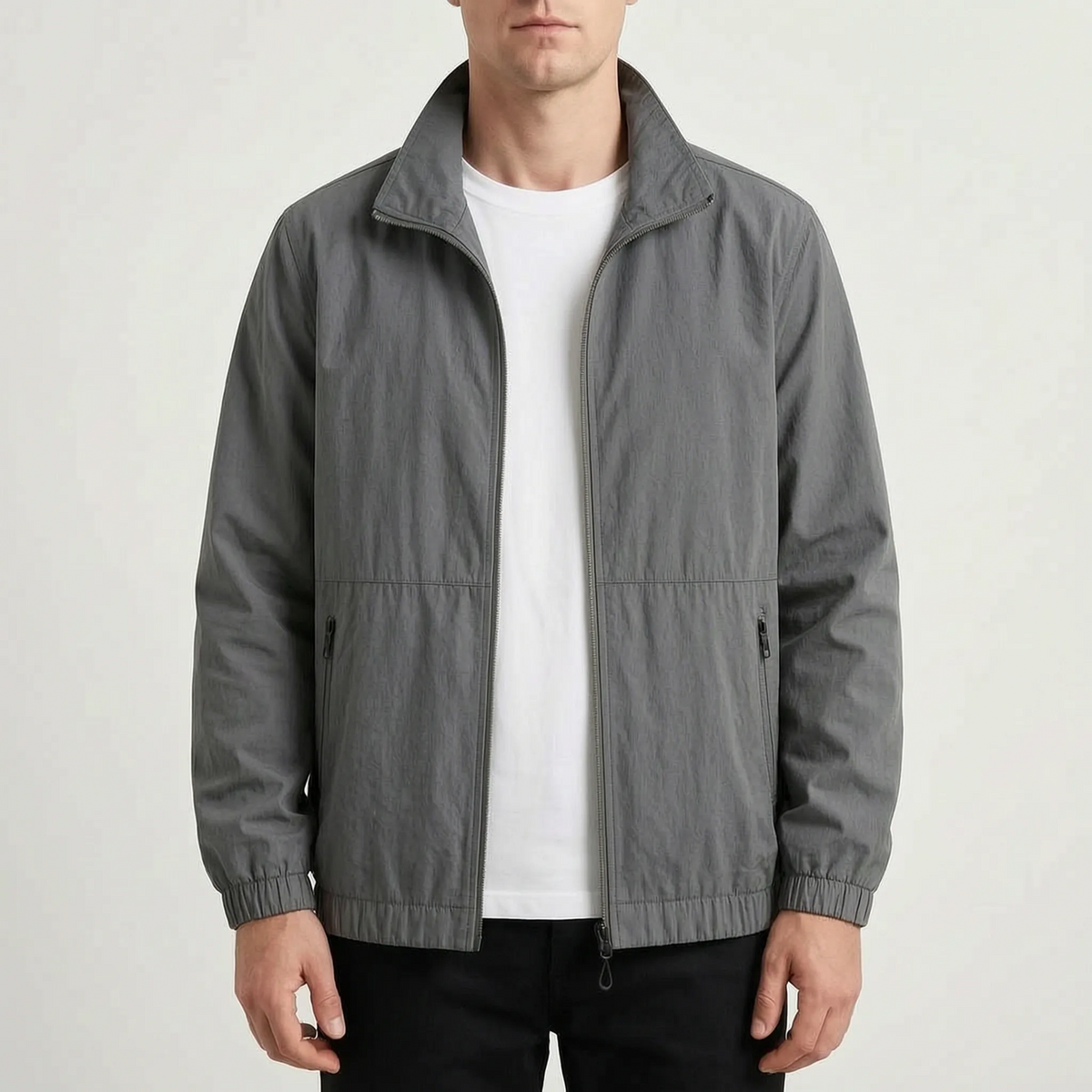 Men's plain zip-front jacket with stand collar, long sleeves and zipped side pockets