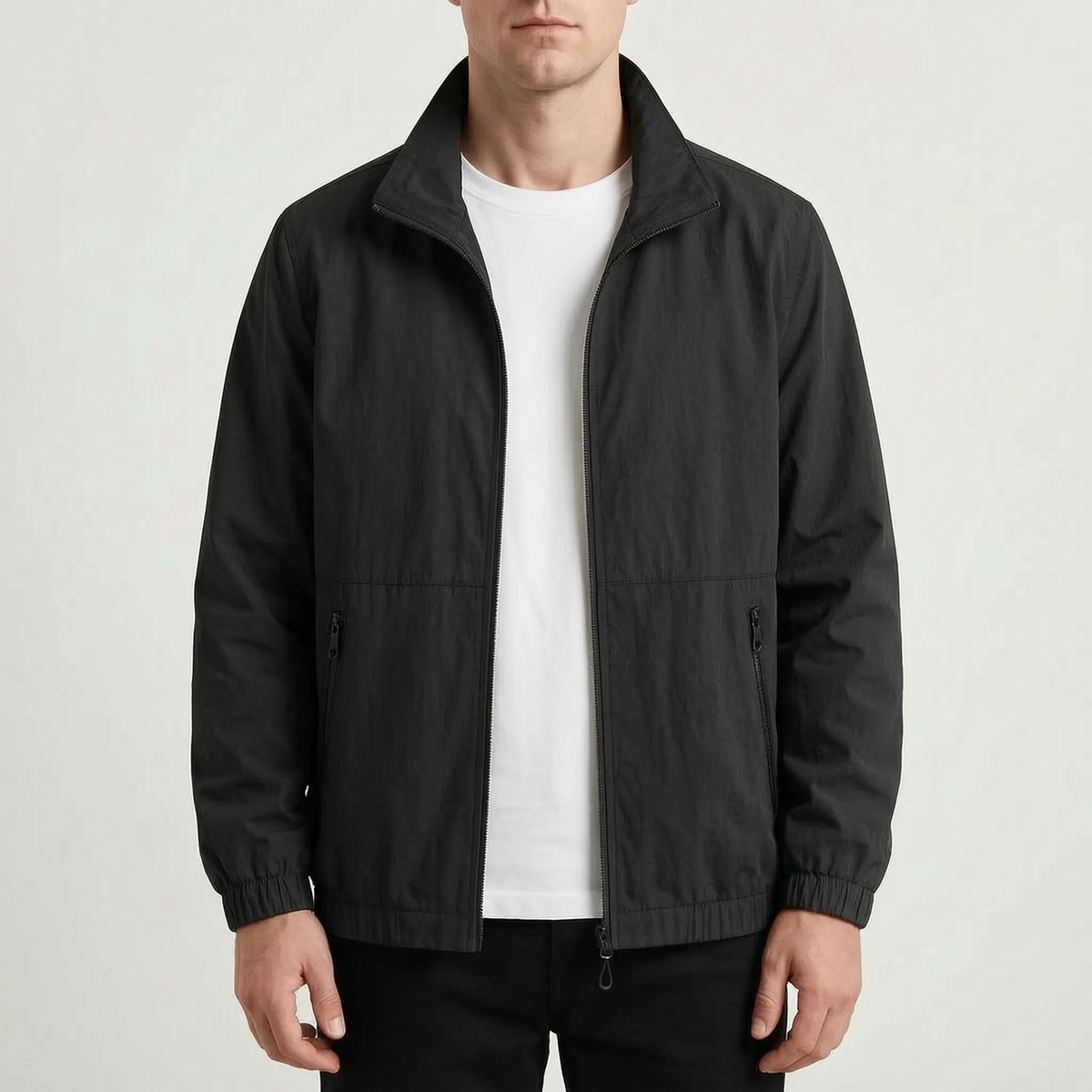 Men's plain zip-front jacket with stand collar, long sleeves and zipped side pockets