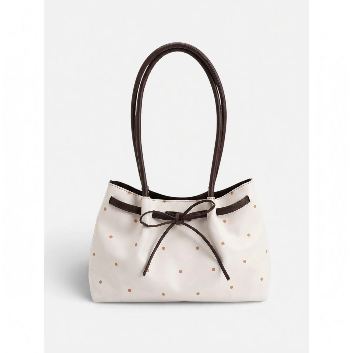 Women's flared tote bag with scattered studs, long handles and front bow tie detail
