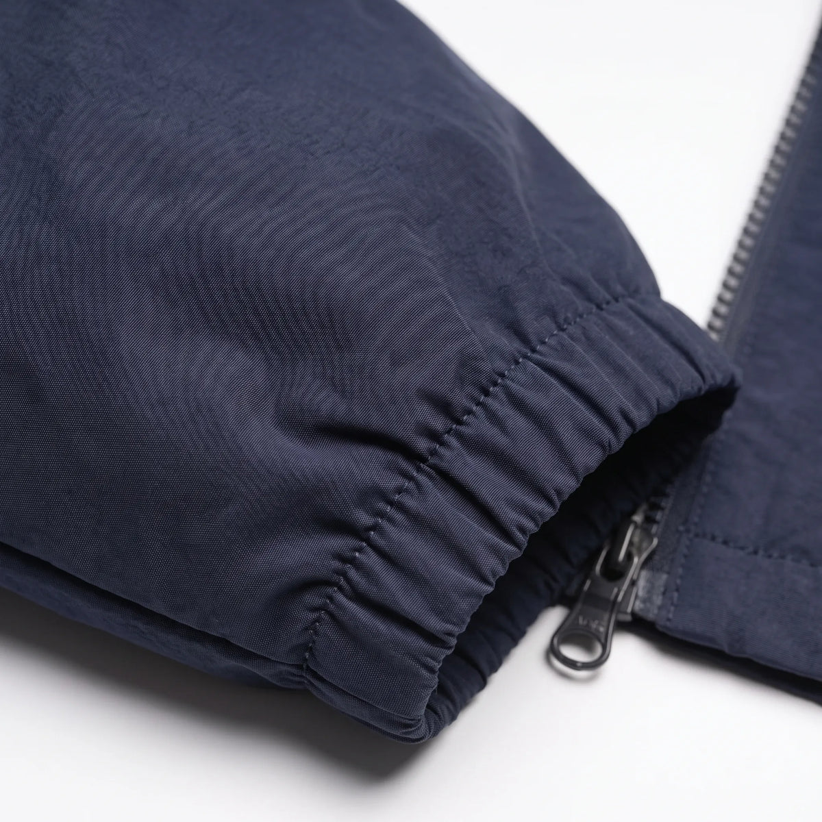 Men's lightweight zip-up windbreaker jacket with stand collar and zipped pockets