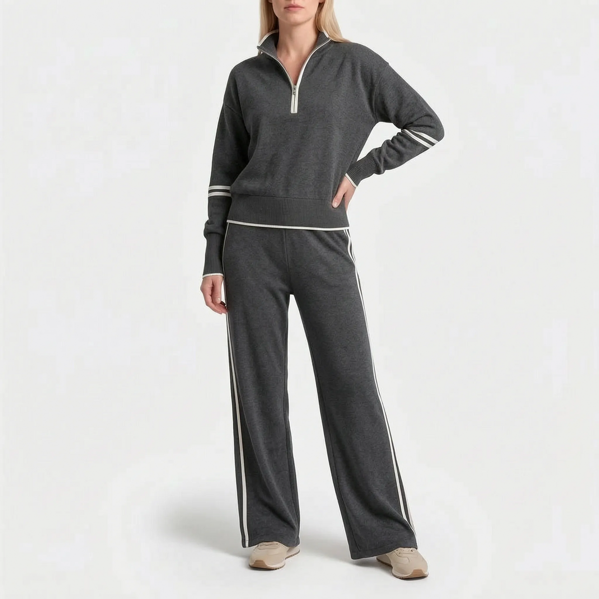 Women's knitted two-piece set with quarter-zip top, wide-leg trousers and contrast stripes