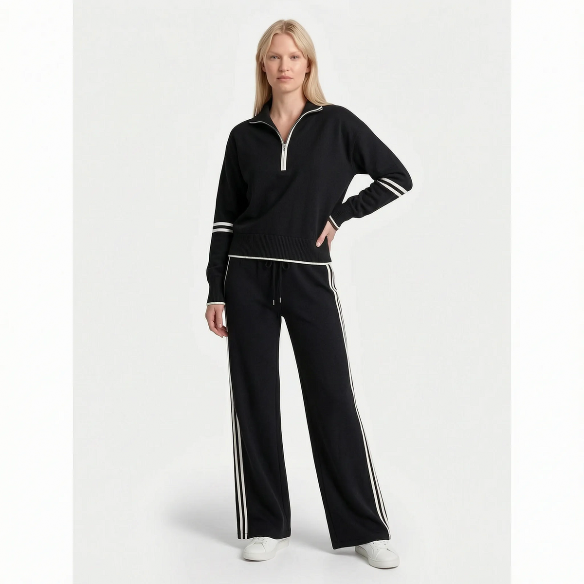 Women's knitted two-piece set with quarter-zip top, wide-leg trousers and contrast stripes