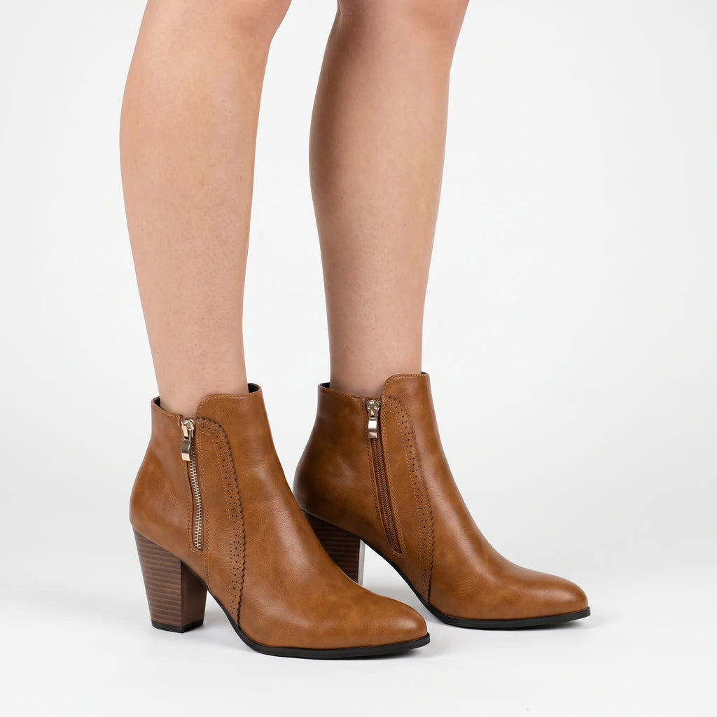 Women's ankle boots with almond toes, side zips and high block heels