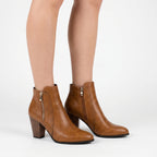 Women's ankle boots with almond toes, side zips and high block heels