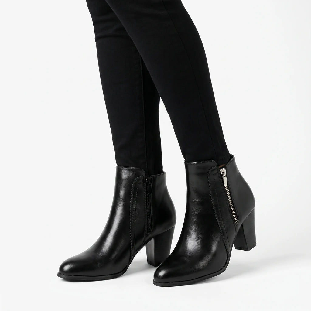 Women's ankle boots with almond toes, side zips and high block heels