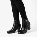 Women's ankle boots with almond toes, side zips and high block heels
