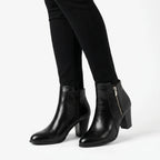 Women's ankle boots with almond toes, side zips and high block heels