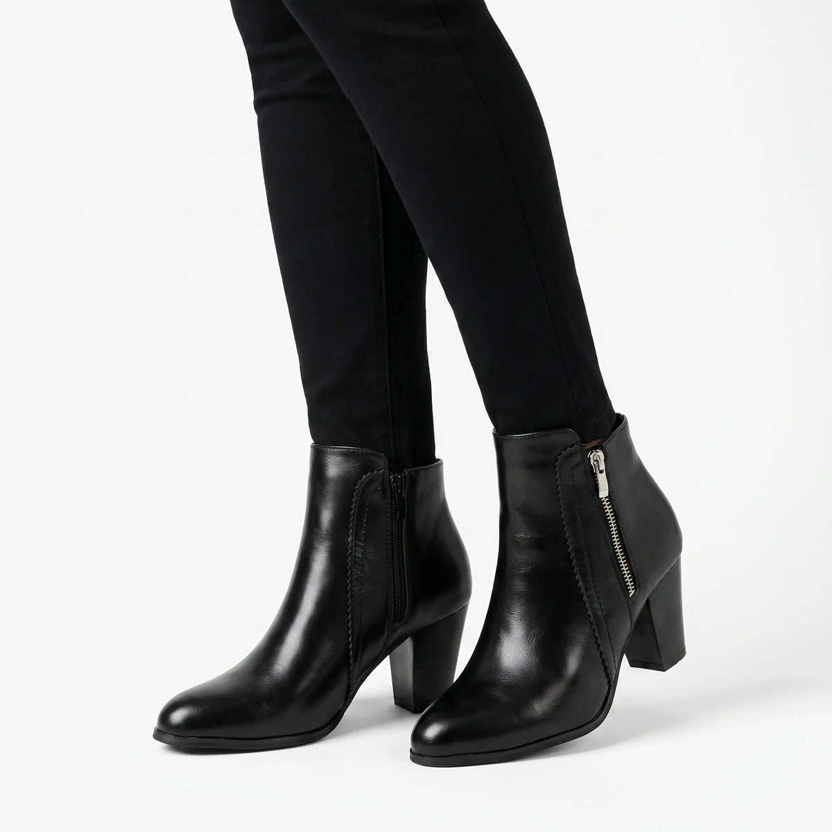 Women's ankle boots with almond toes, side zips and high block heels
