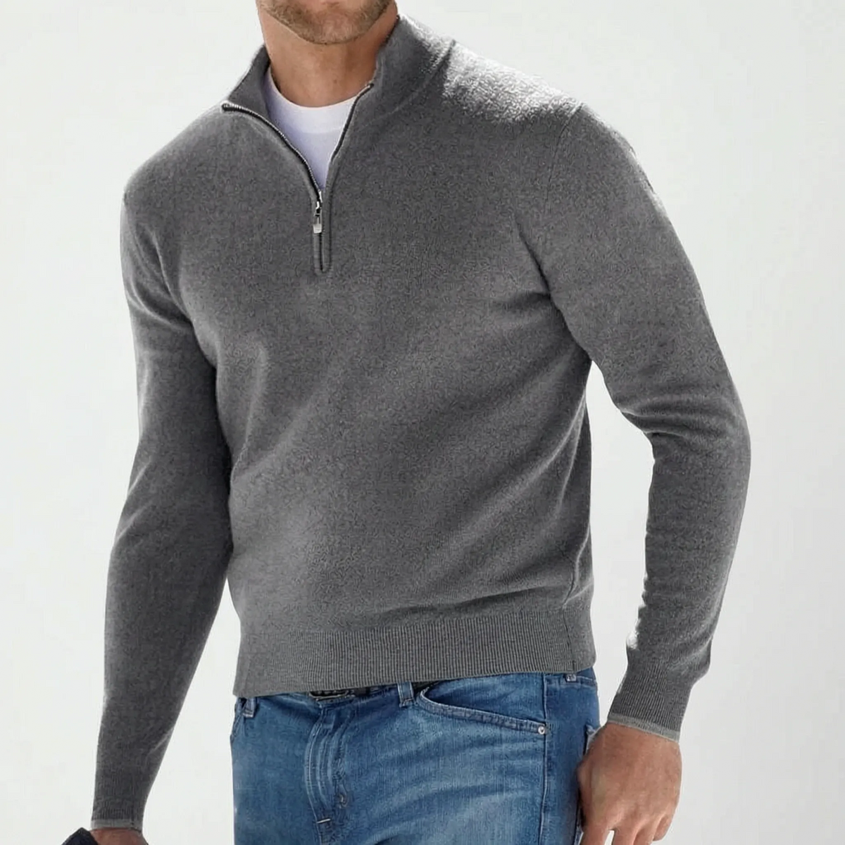 Men's blue quarter zip knit jumper with stand collar and long sleeves