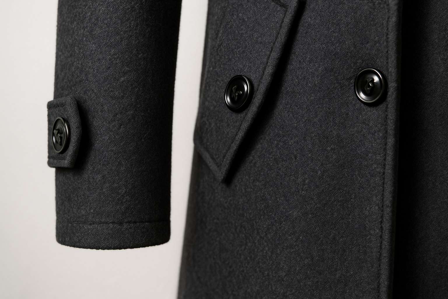 Men's textured long overcoat with high collar, lapels, button pockets and zip fastening