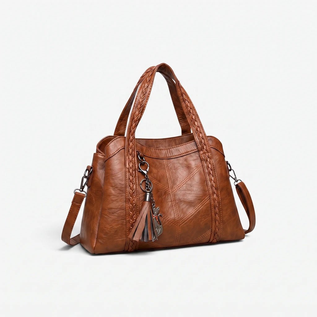 Women's structured tote handbag with diamond-point stitching and top handles