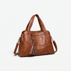 Women's structured tote handbag with diamond-point stitching and top handles