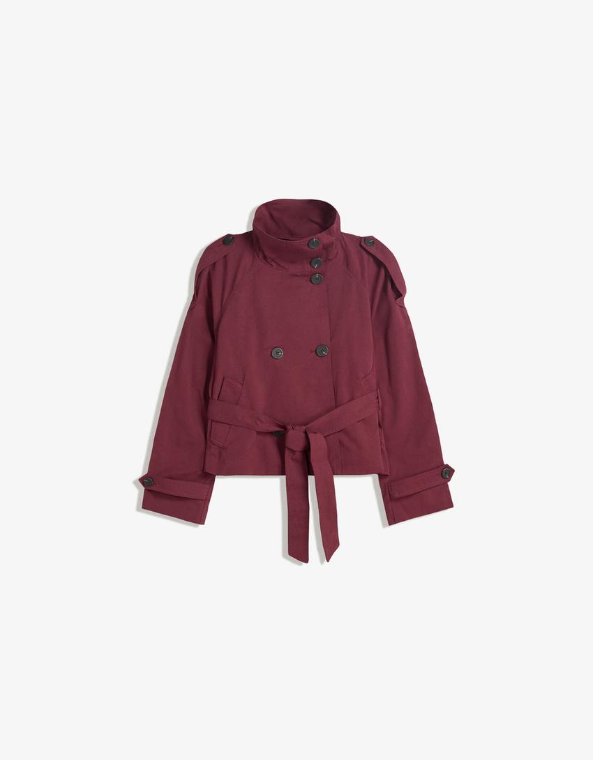 Women's cropped trench jacket with high collar, buttons, belt and shoulder tabs