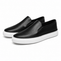 Textured slip-on loafers with rounded toes and flat contrasting soles