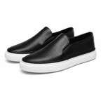 Textured slip-on loafers with rounded toes and flat contrasting soles