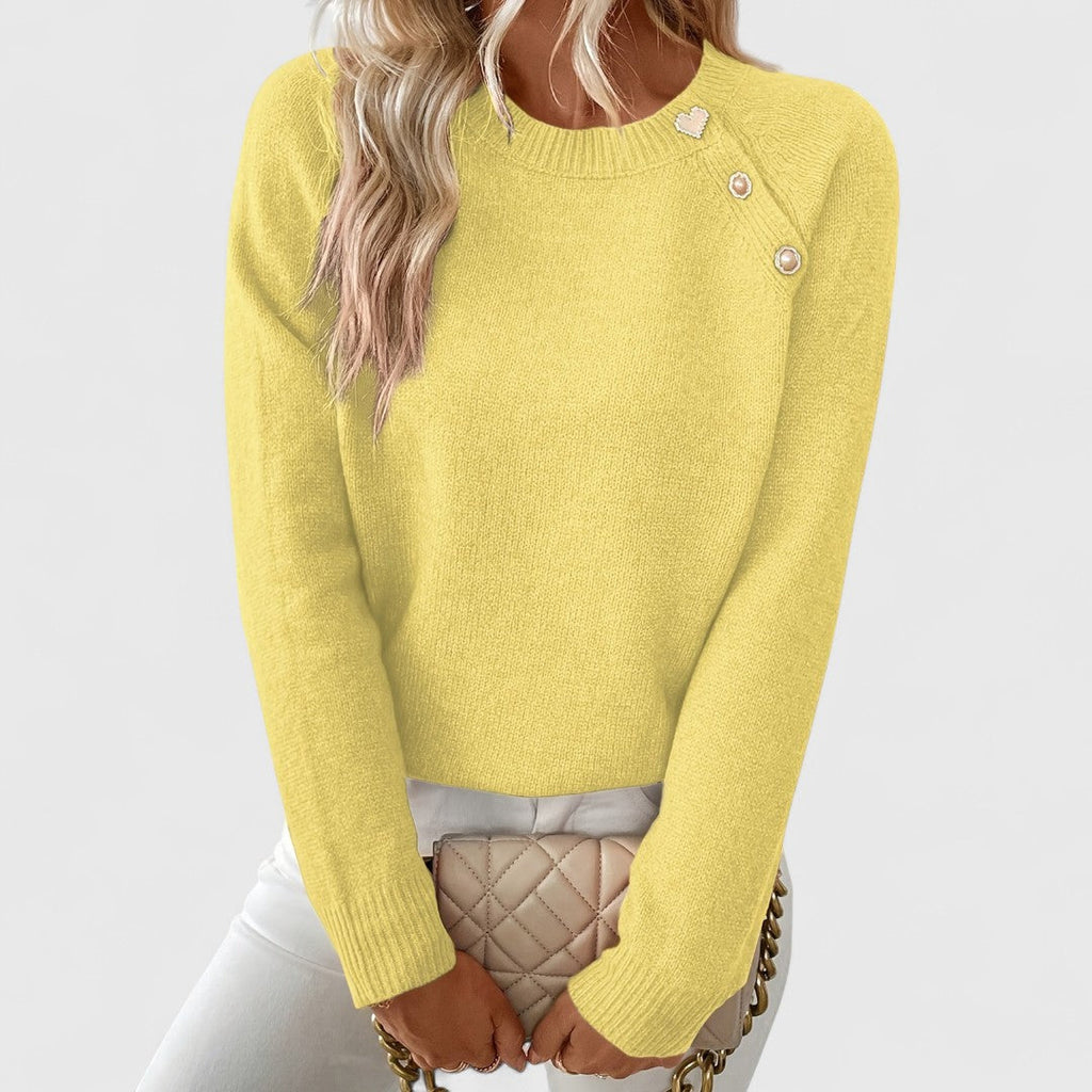Women's crew neck knitted jumper with long sleeves and upper front button detail