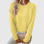 Women's crew neck knitted jumper with long sleeves and upper front button detail