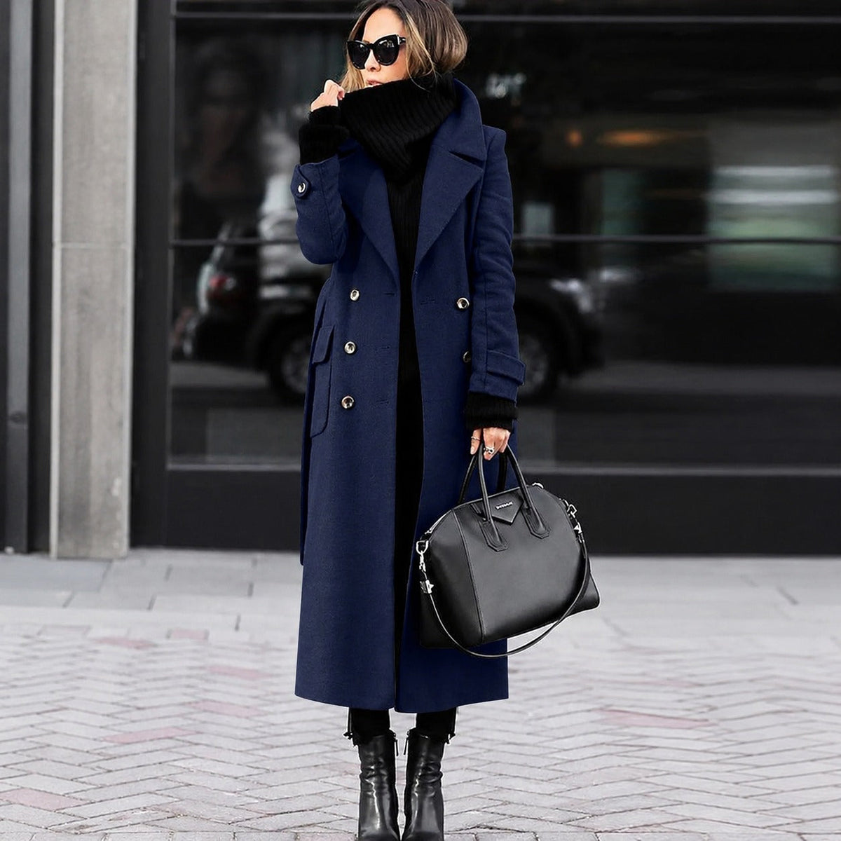 Women's long fitted double-breasted coat with notched lapels and buttoned cuffs