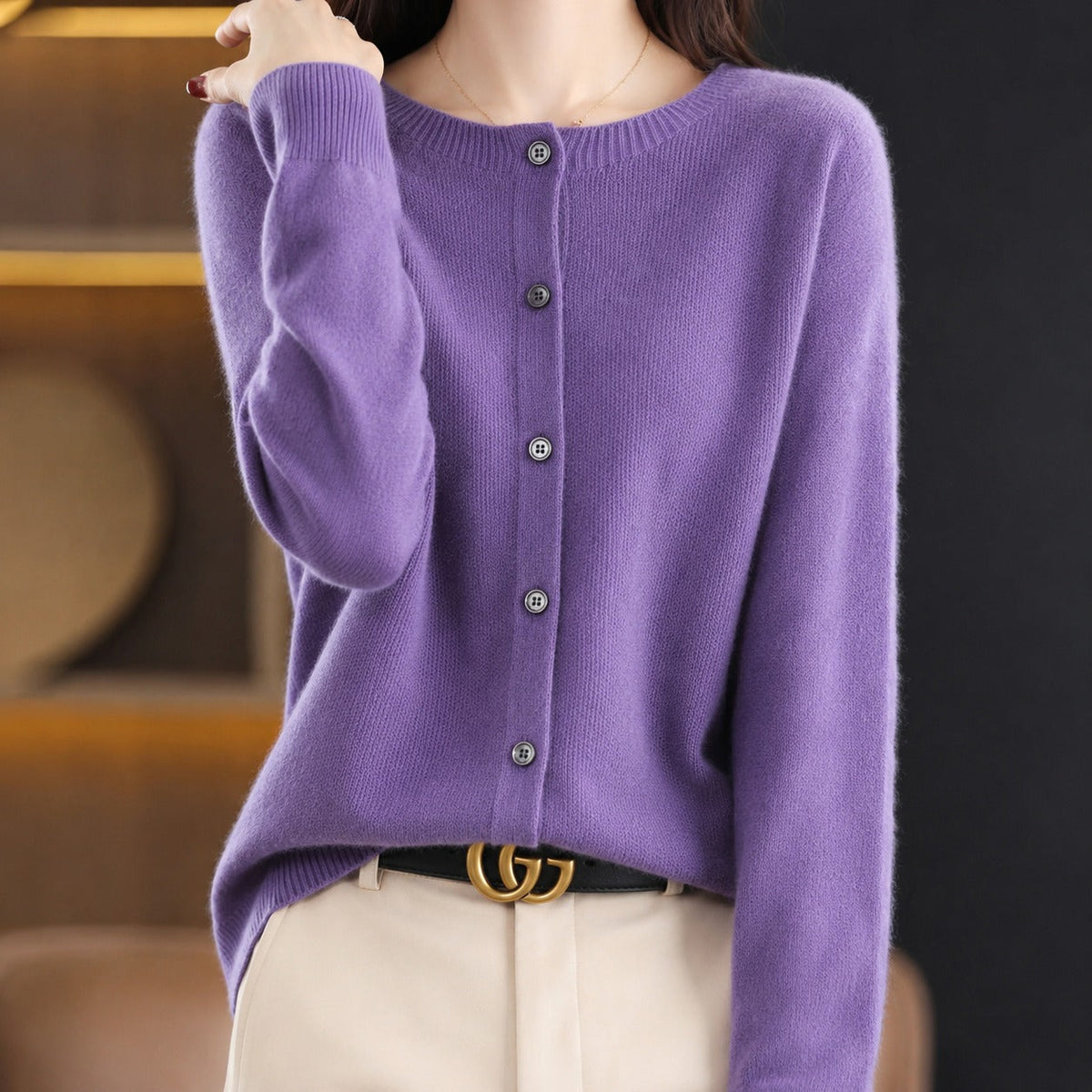 Women's plain knitted button-front cardigan with crew neckline and long sleeves