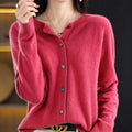 Women's plain knitted button-front cardigan with crew neckline and long sleeves