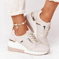 Women's lace-up wedge sneakers with perforated panels and metallic trims