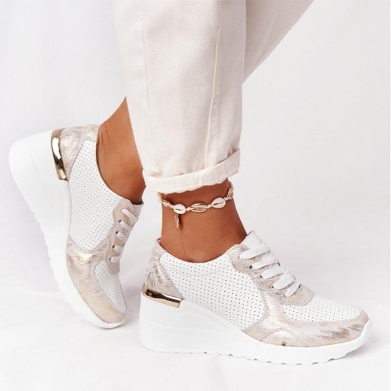 Women's lace-up wedge sneakers with perforated panels and metallic trims